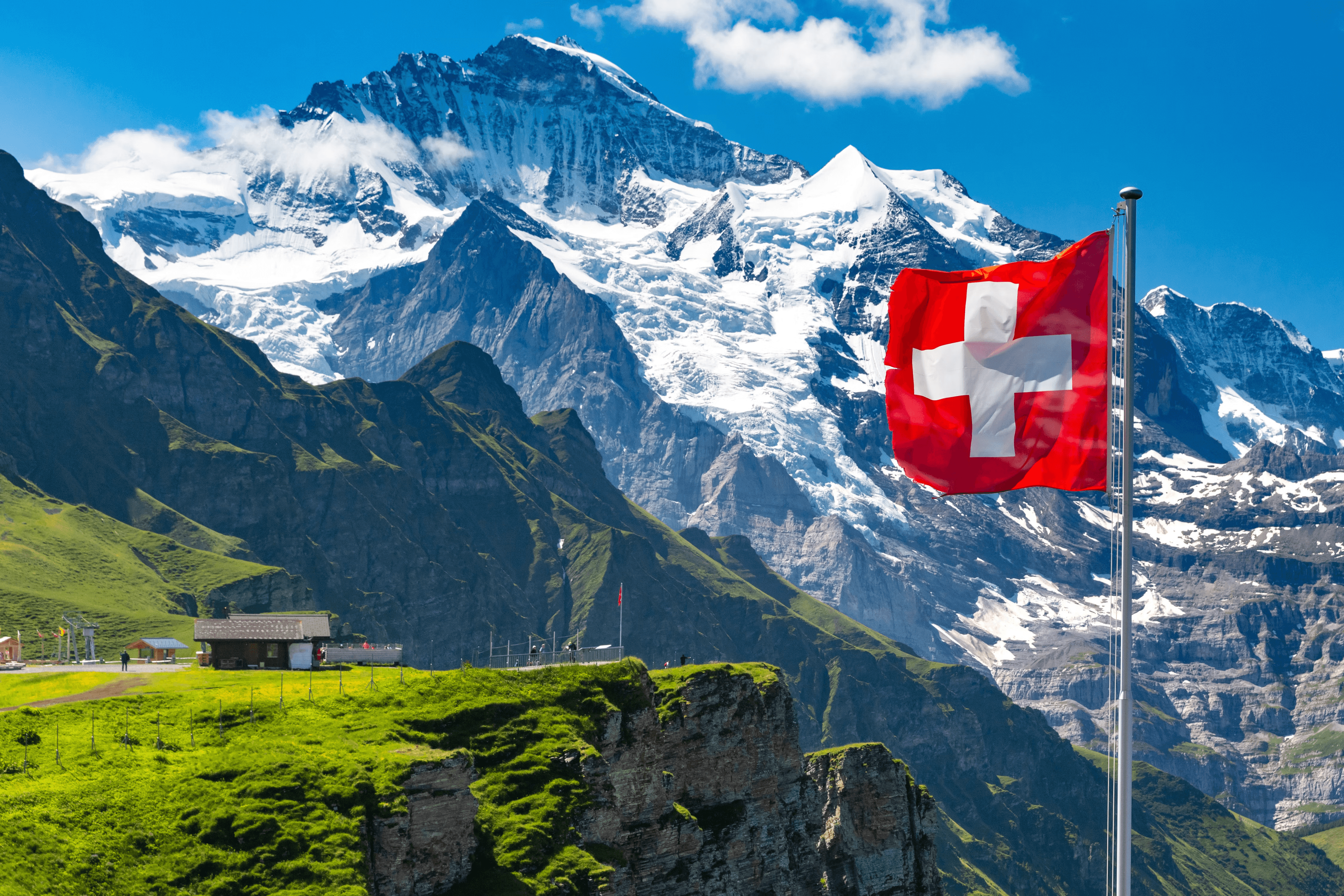 Swiss alps with a flag